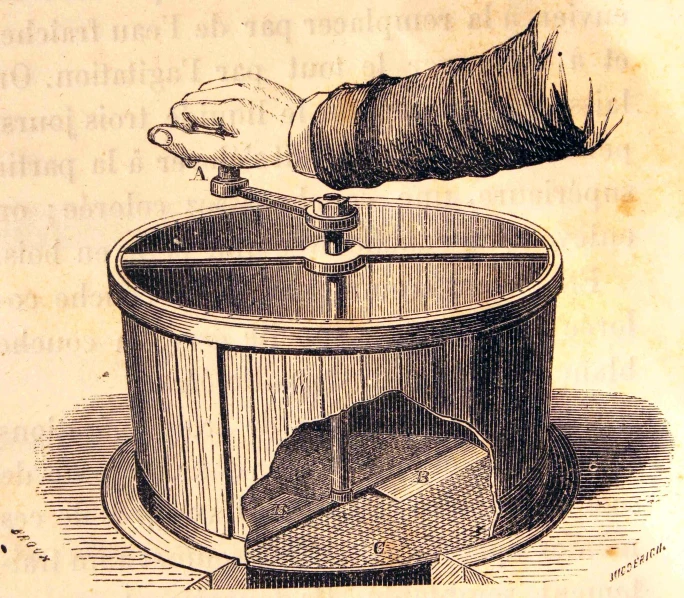 a drawing of an old fashioned hand spinning soing over a barrel