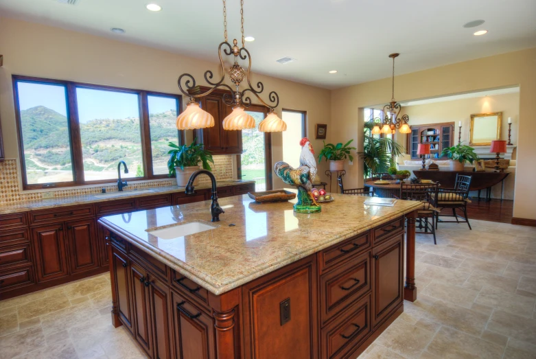 the large kitchen features granite counters, and wooden cabinets