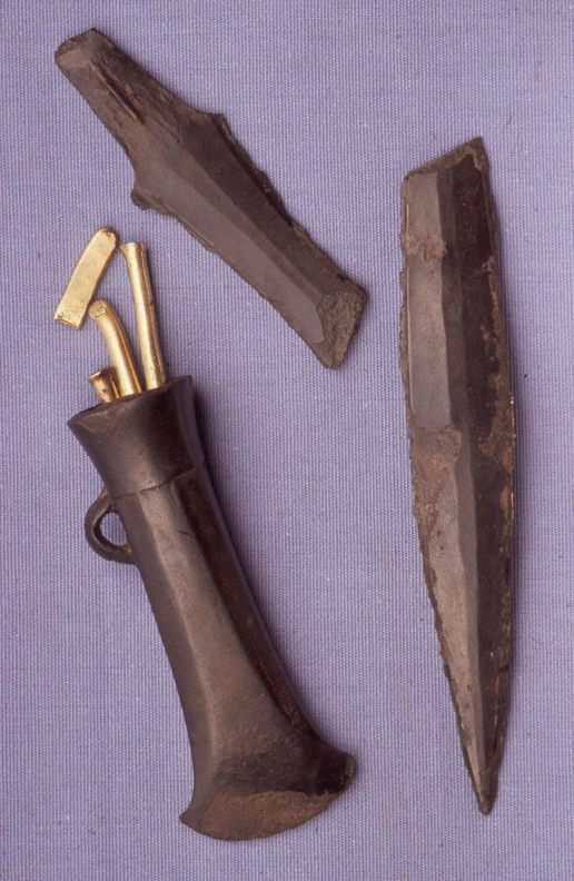 two pieces of old type weapons one knife and one razor