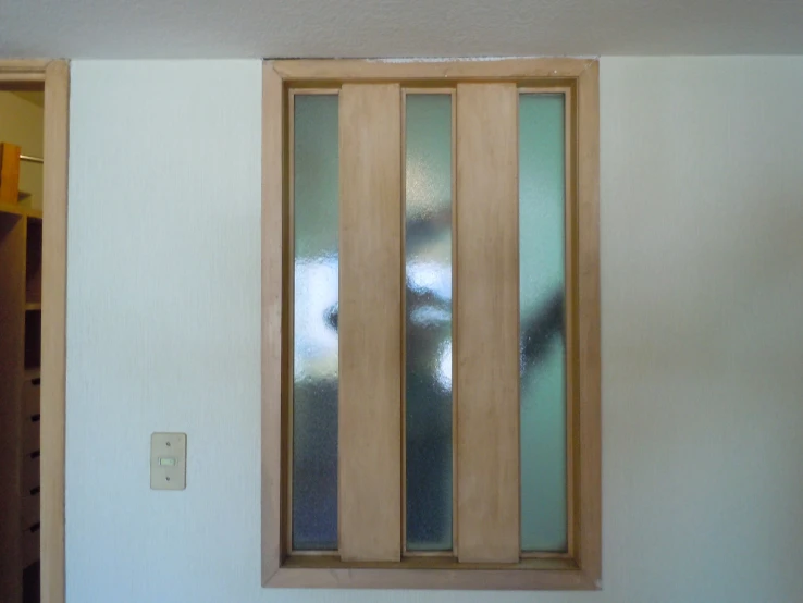 a house with clear glass on the front door