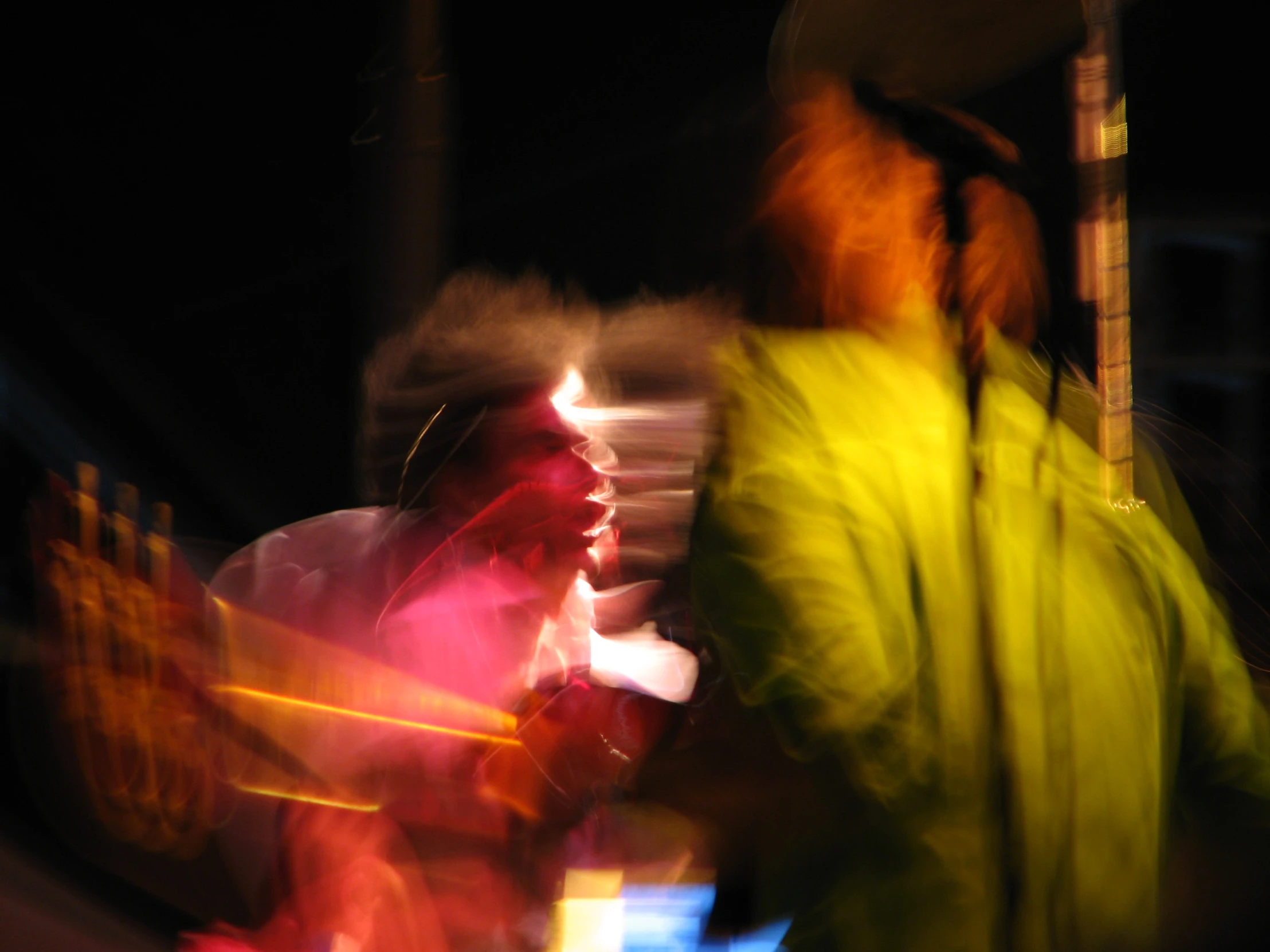 a man and woman dressed in colorful clothing