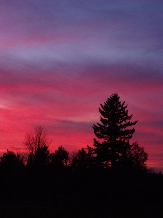 sunset with pink and purple clouds in the sky