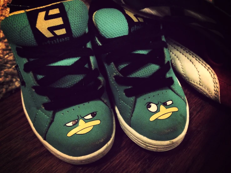 the angry birds shoes have blue and green accents