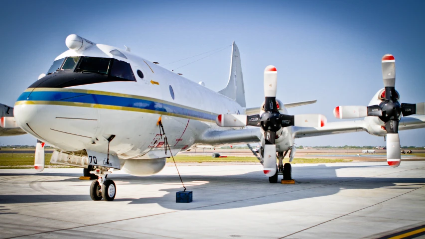 an airplane sits on the runway and ready for take off