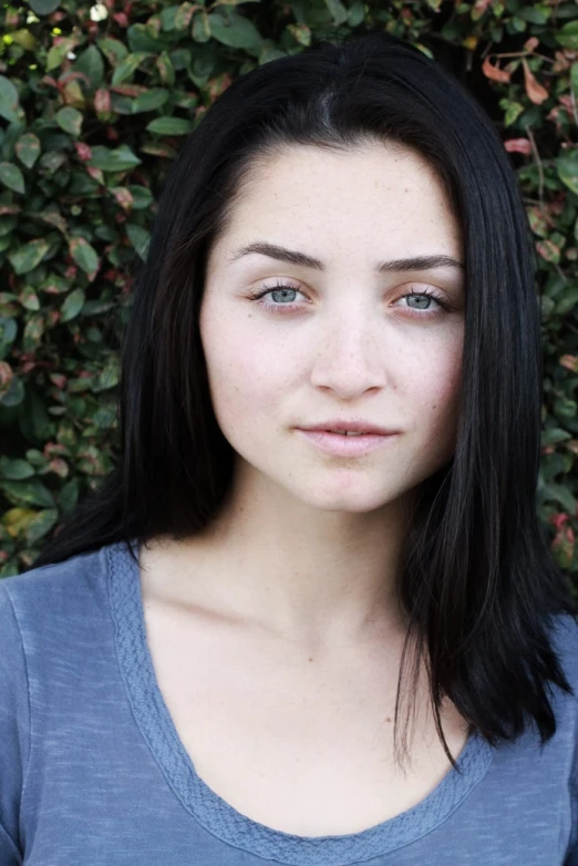 a close - up of a girl looking at the camera