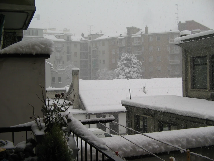 some buildings with some snow on top of them