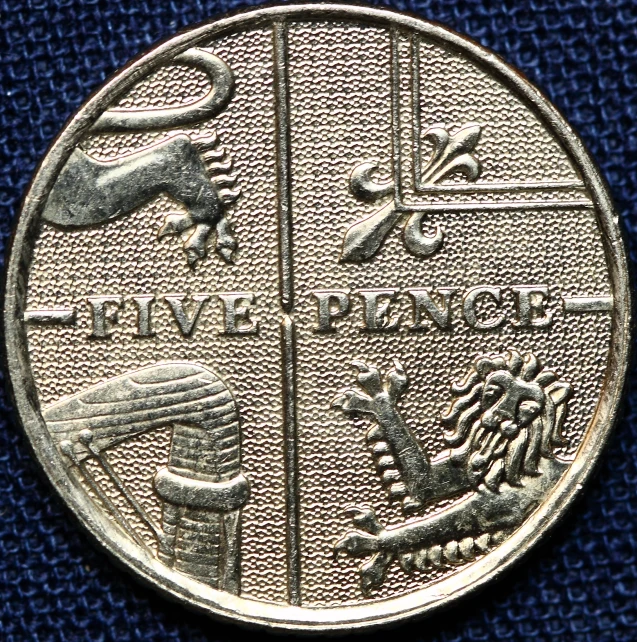 the silver coin shows the image of two birds on a nch