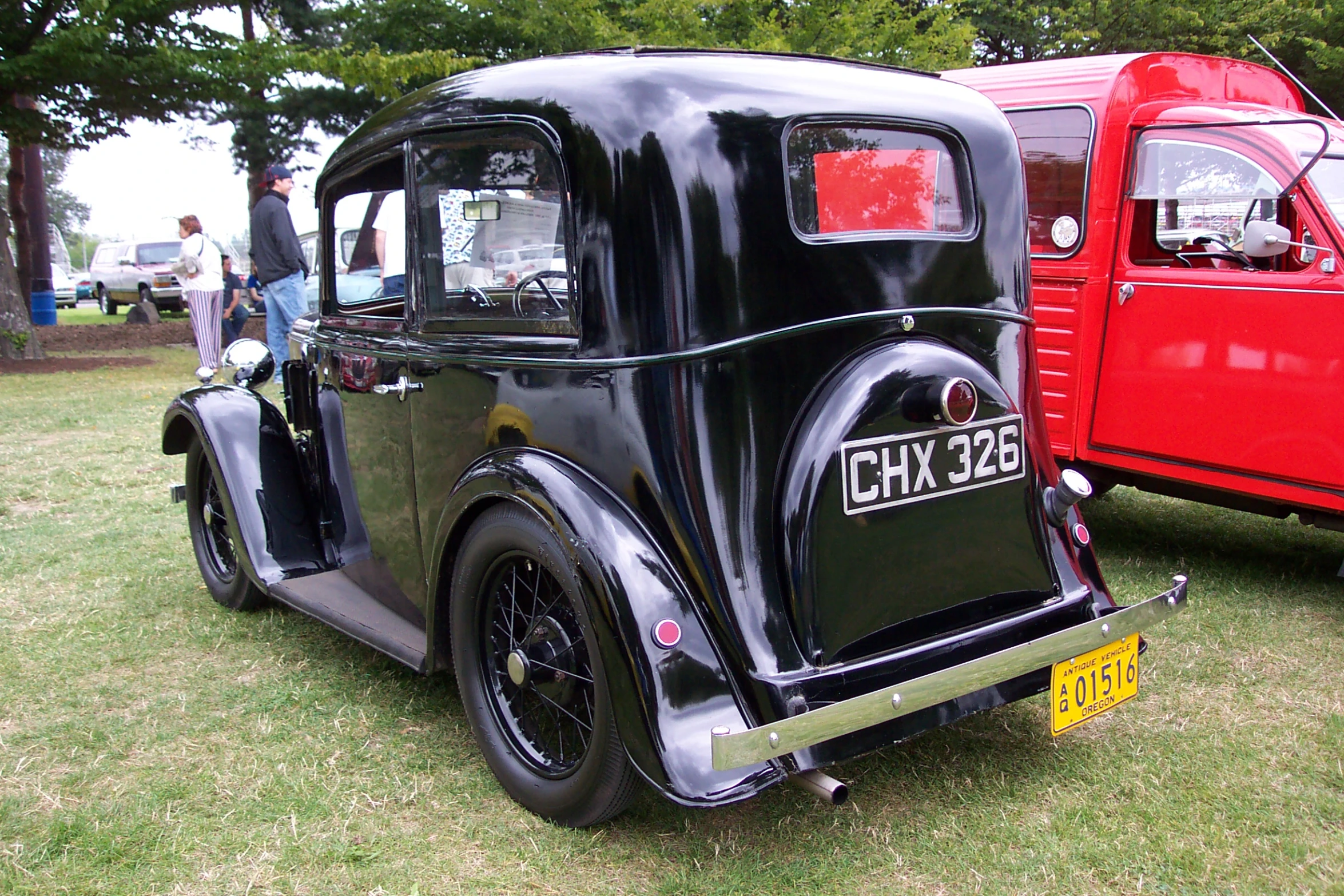 a classic car is on display at an event