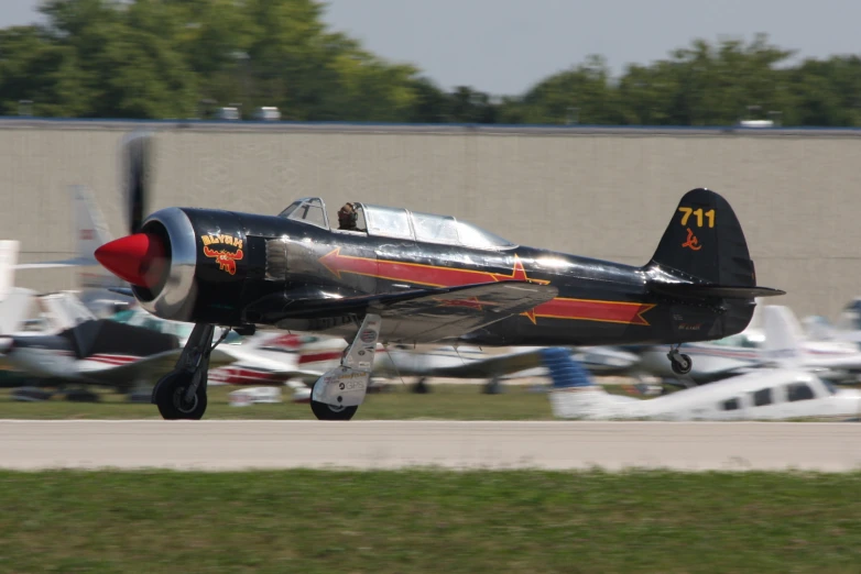 an airplane that is flying around on the runway