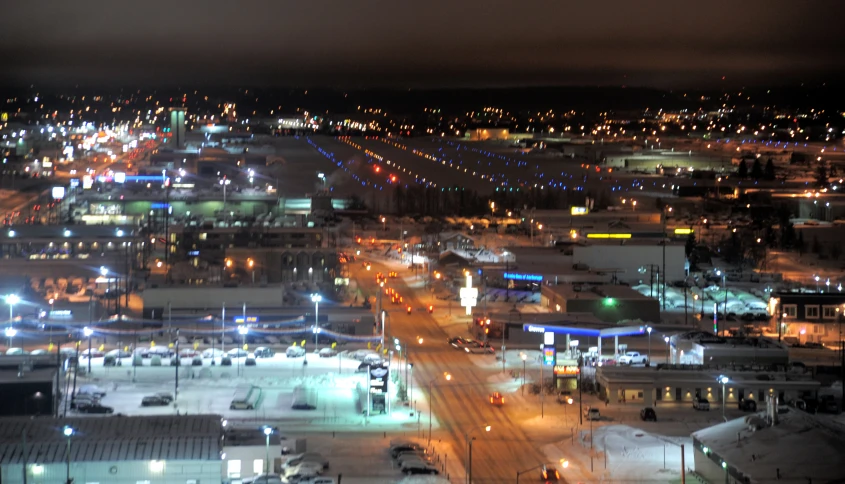 a city street is lit up in all the lights