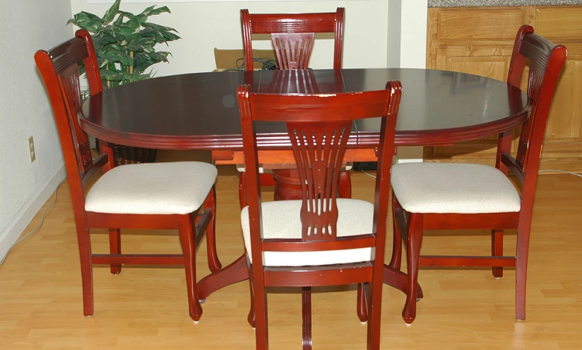 a table and chairs set up for a dining room