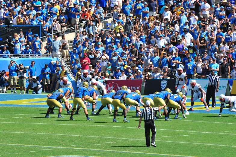 a football team running on to the field