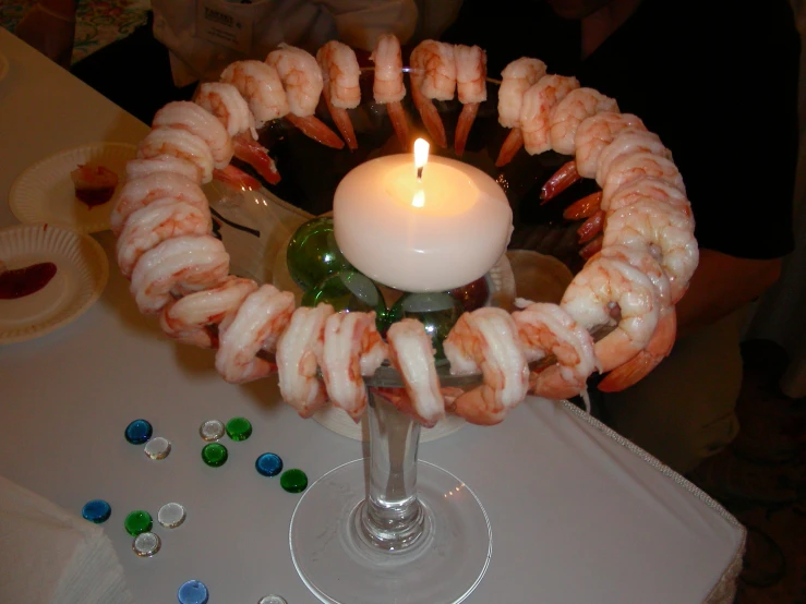 a close up of a cake decoration with a candle