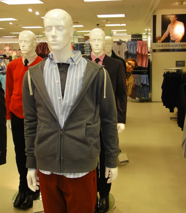 mannequins are dressed nicely for winter in the store