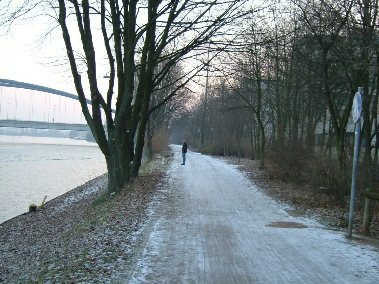 a man is standing near a water line