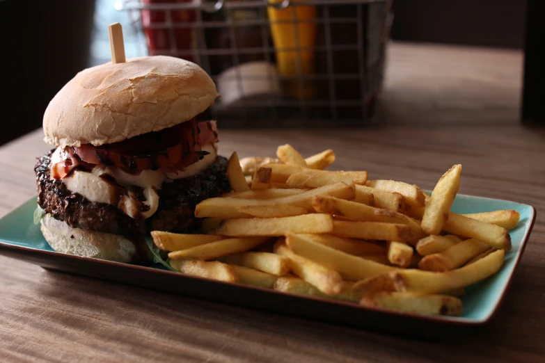 sandwich and fries on the plate in a fast food restaurant