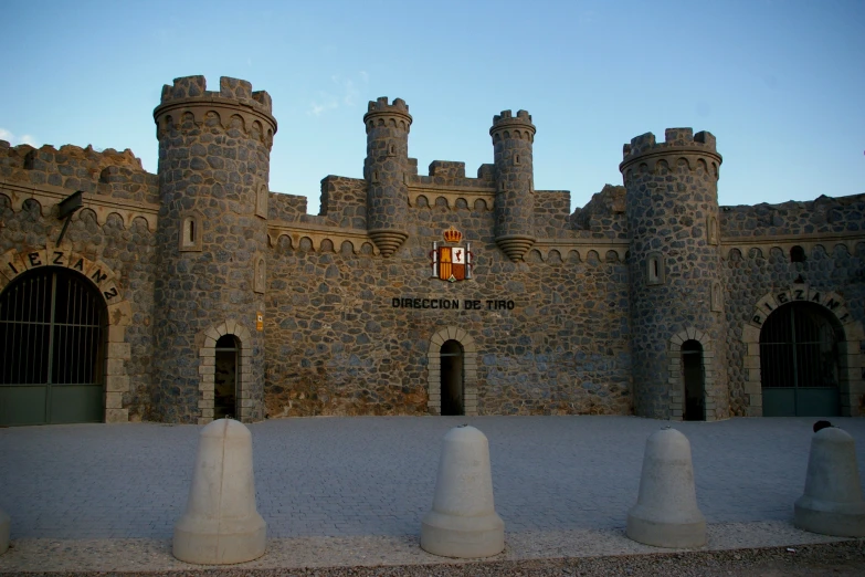 the entrance of a castle built of stone