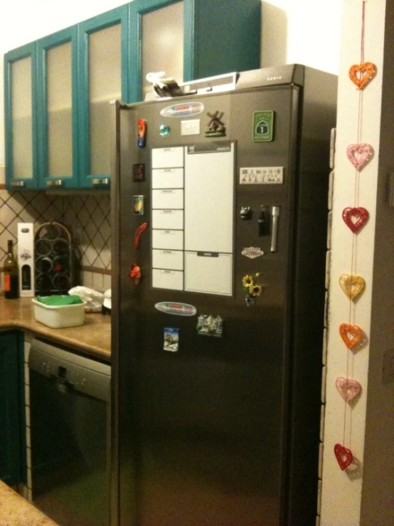 a large refrigerator sits next to a table