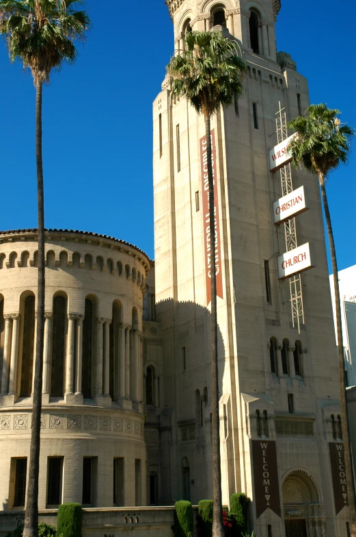 a tall white tower building with a clock