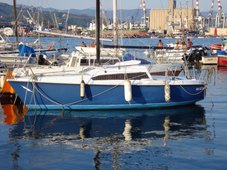 boats are docked at the pier in a marina