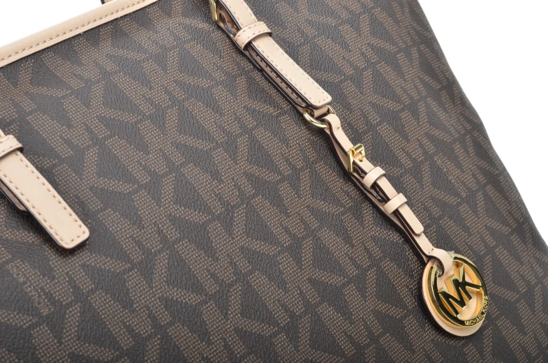handbag with monogram motif on handles and strap