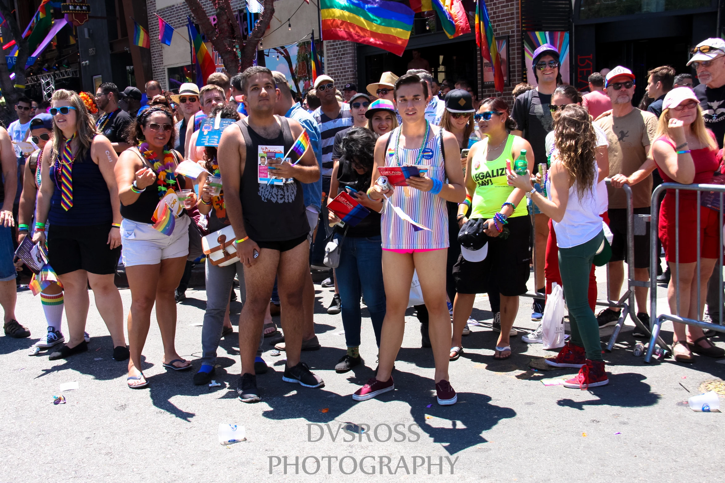 the people are all standing outside in their underwear