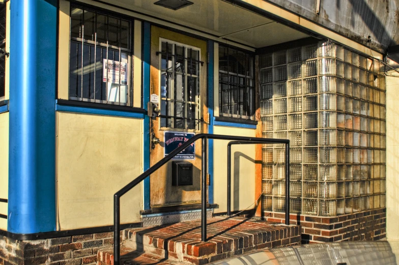 a staircase and a building with glass doors