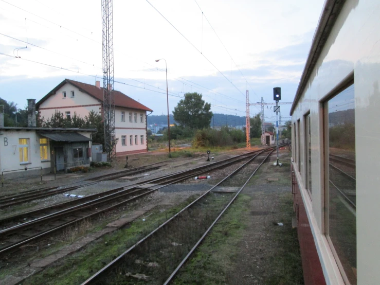 train tracks and buildings in an industrial setting