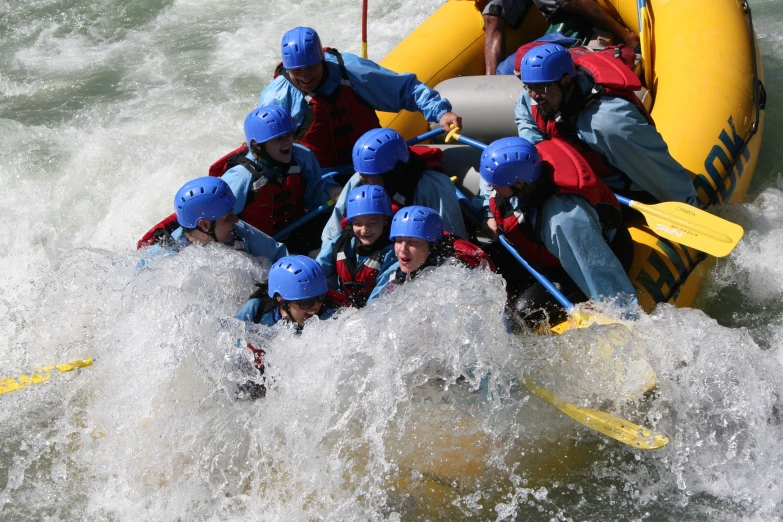 six people rafting in the ocean in the ocean