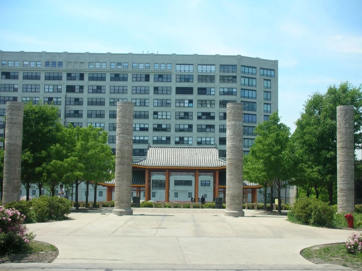 a large building with pillars in front of it