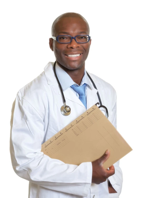 a man dressed in white with a medical kit