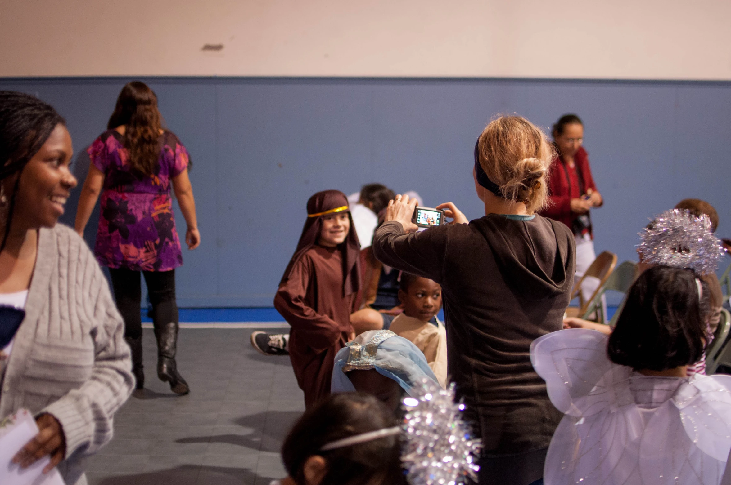 several little girls are dressed up for a parade