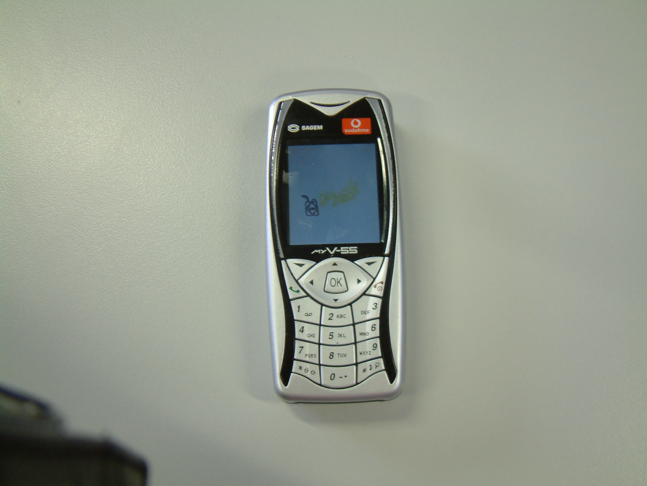 a nokia phone is laying on a counter