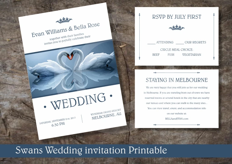 a wedding invitation with two swans on it