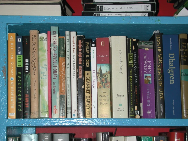 a bookshelf with many different types of books on it