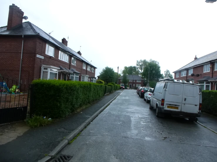 a line of buildings on the side of a road