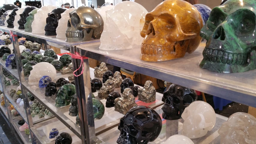 a display case with skulls and crystal skulls