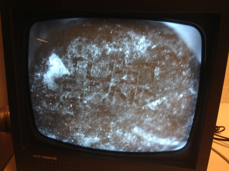 the back side of an old tv with text reading santa