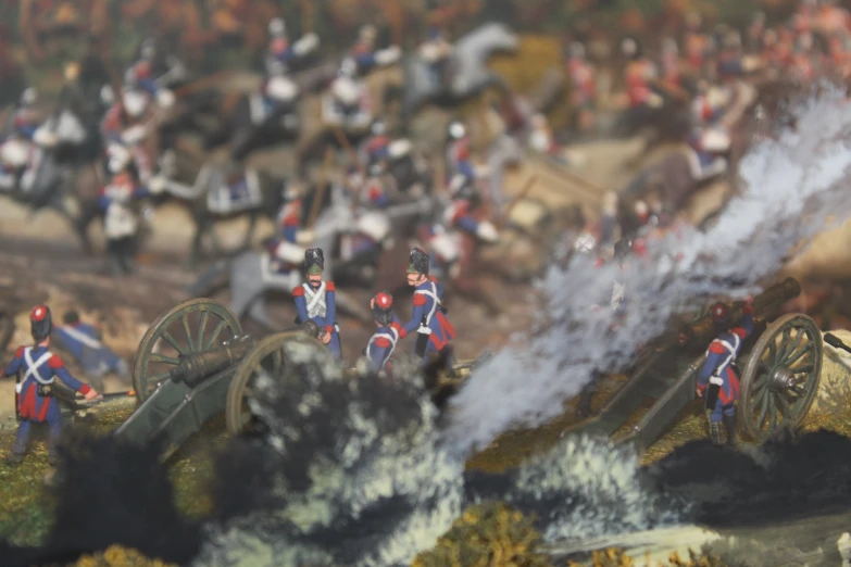 a model set of an army battle with many different figures