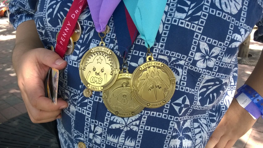 a person wearing three medals standing on a street