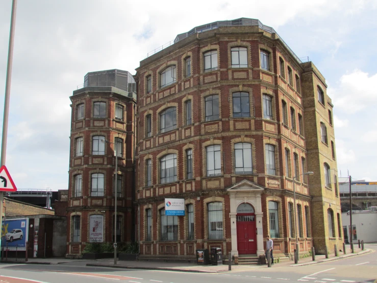 the building is a very nice and old, brown colored