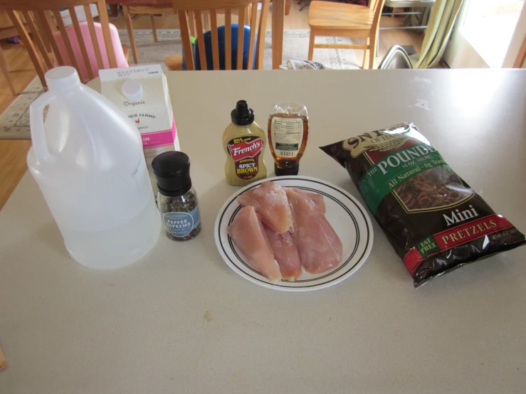 ingredients needed for making dish sit atop a white table