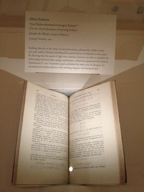 open book in an old museum contains a poem by shakespeare hamlet