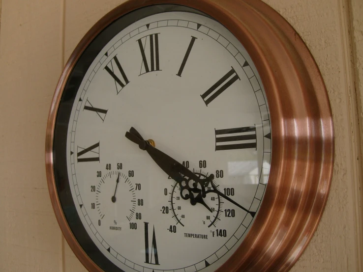 a large clock on the wall reads 4 55