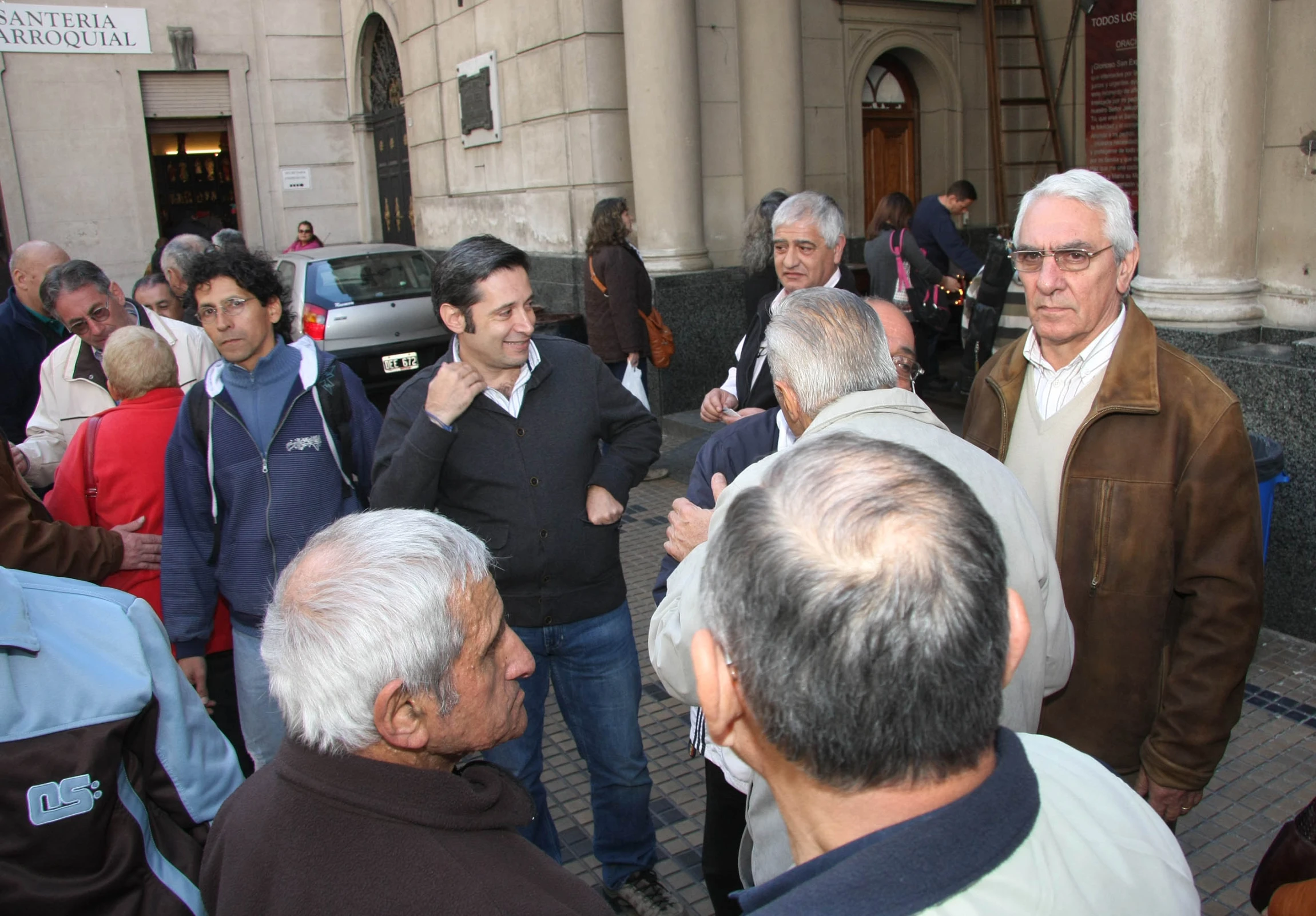 a bunch of people that are standing in the street