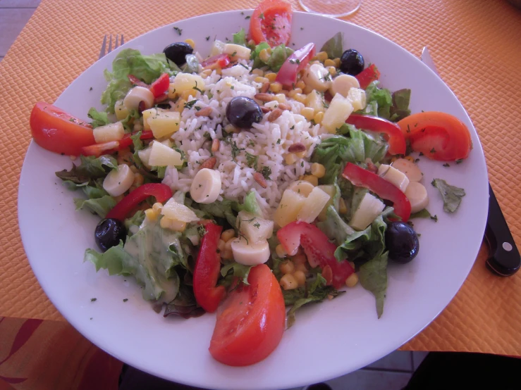 a close up of a plate of food with veggies