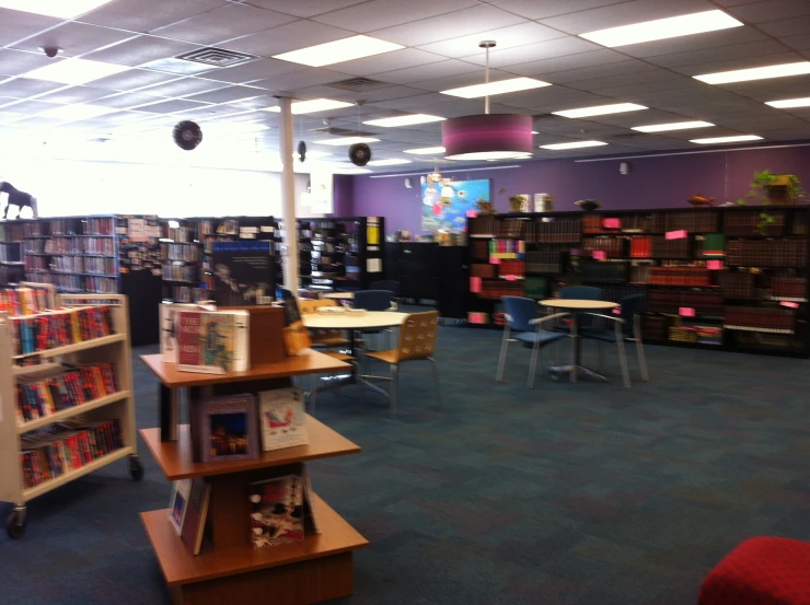 an empty liry with some chairs and desks