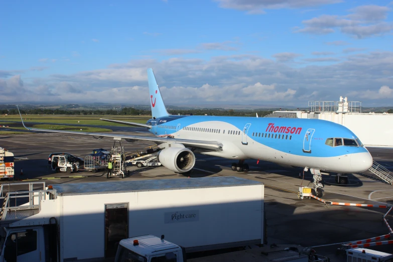 an airplane that is on the runway ready for boarding