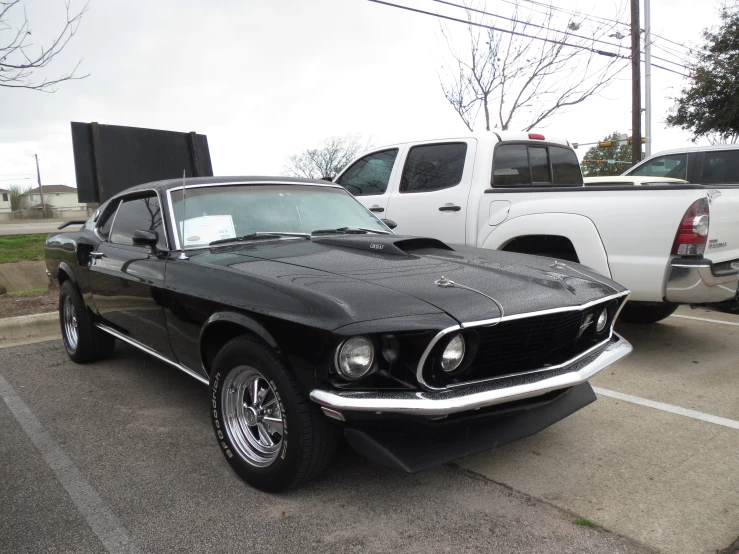 a mustang car is parked in a parking lot