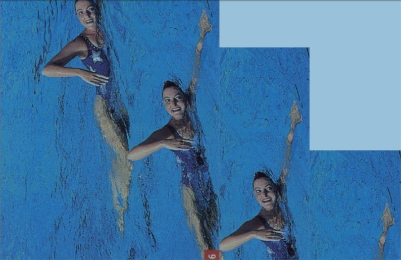 four women in the water wearing a blue swimsuit